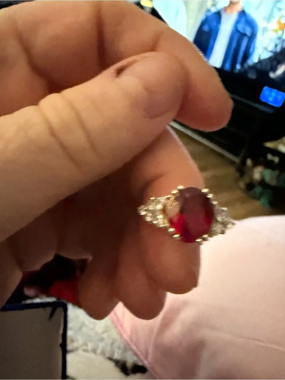 Natural Garnet ring with white sapphires on each side.